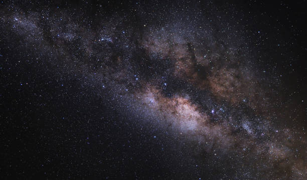 photograph of space with stars and stardust.